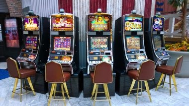 Mobile app interface showing live dealer and slot games